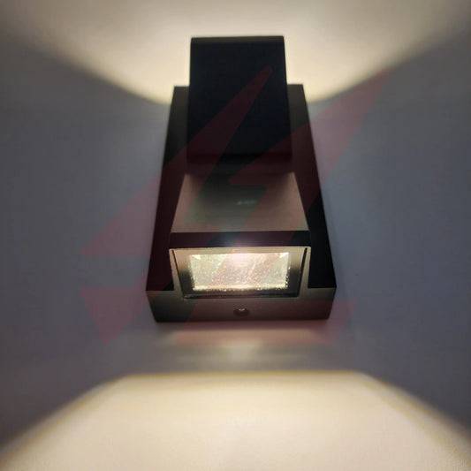 Modern black up and down LED wall light with warm white architectural wall wash effect for indoor and outdoor spaces.
Smart Life Lighting & Electrical
