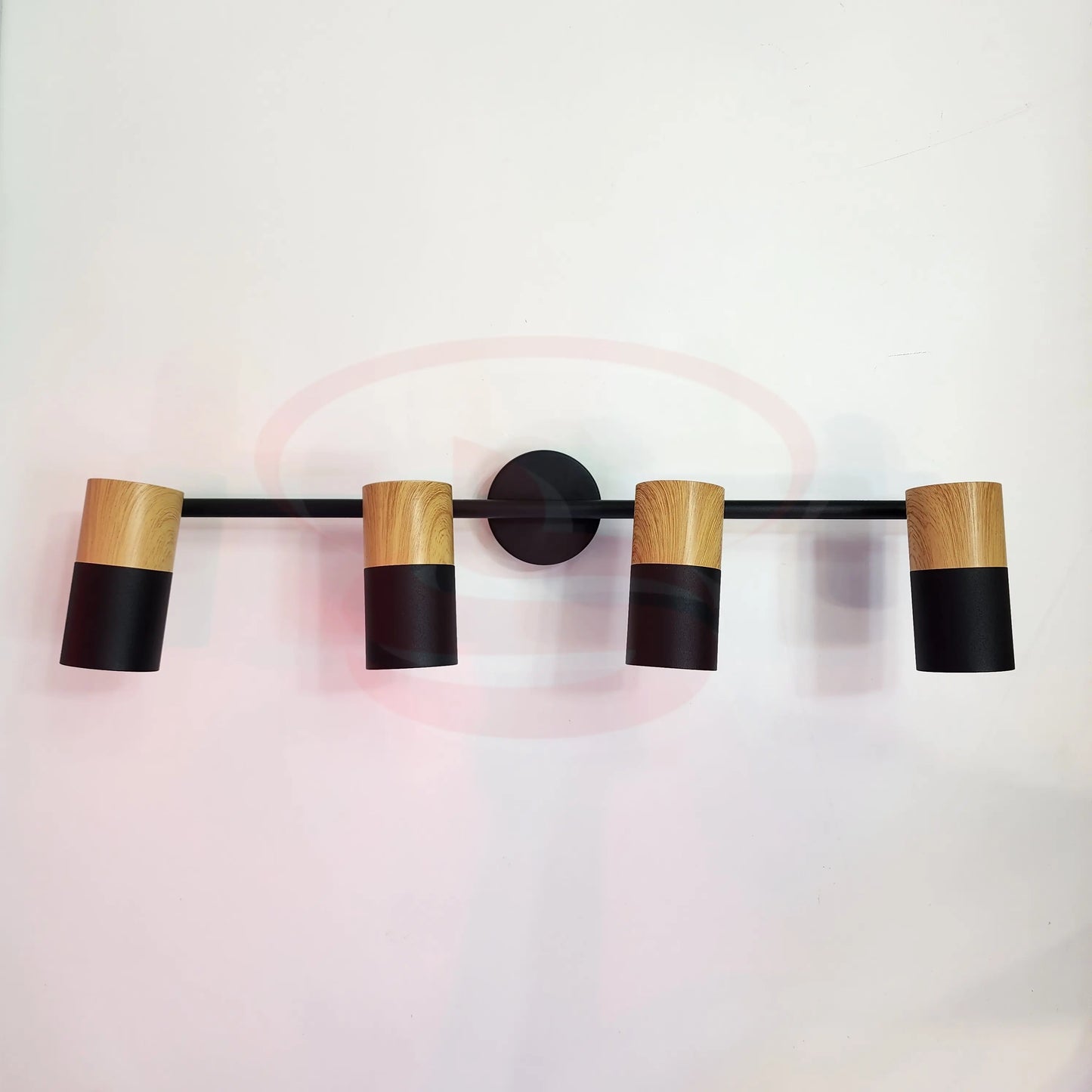 A modern indoor wall spotlight featuring a black rod base and wooden cylinder heads, 4 in One GU10 Globe for home and commercial interiors.
Smart Life Lighting & Electrical