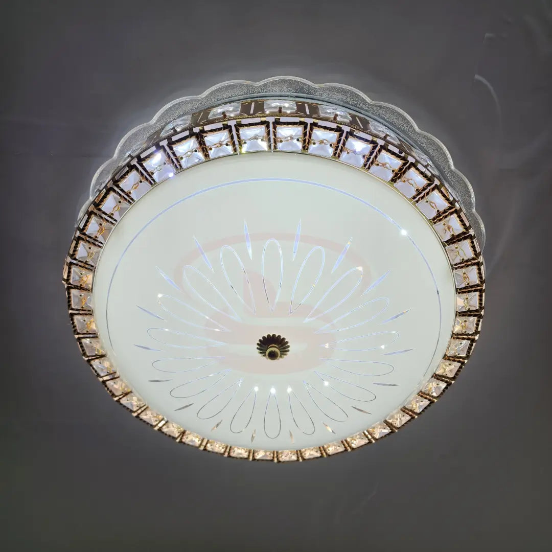 Modern CE-006 LED ceiling light with a crystal-cut border, 3-colour changing illumination, and a soft warm ambient glow for elegant home lighting.
Smart Life Lighting & Electrical