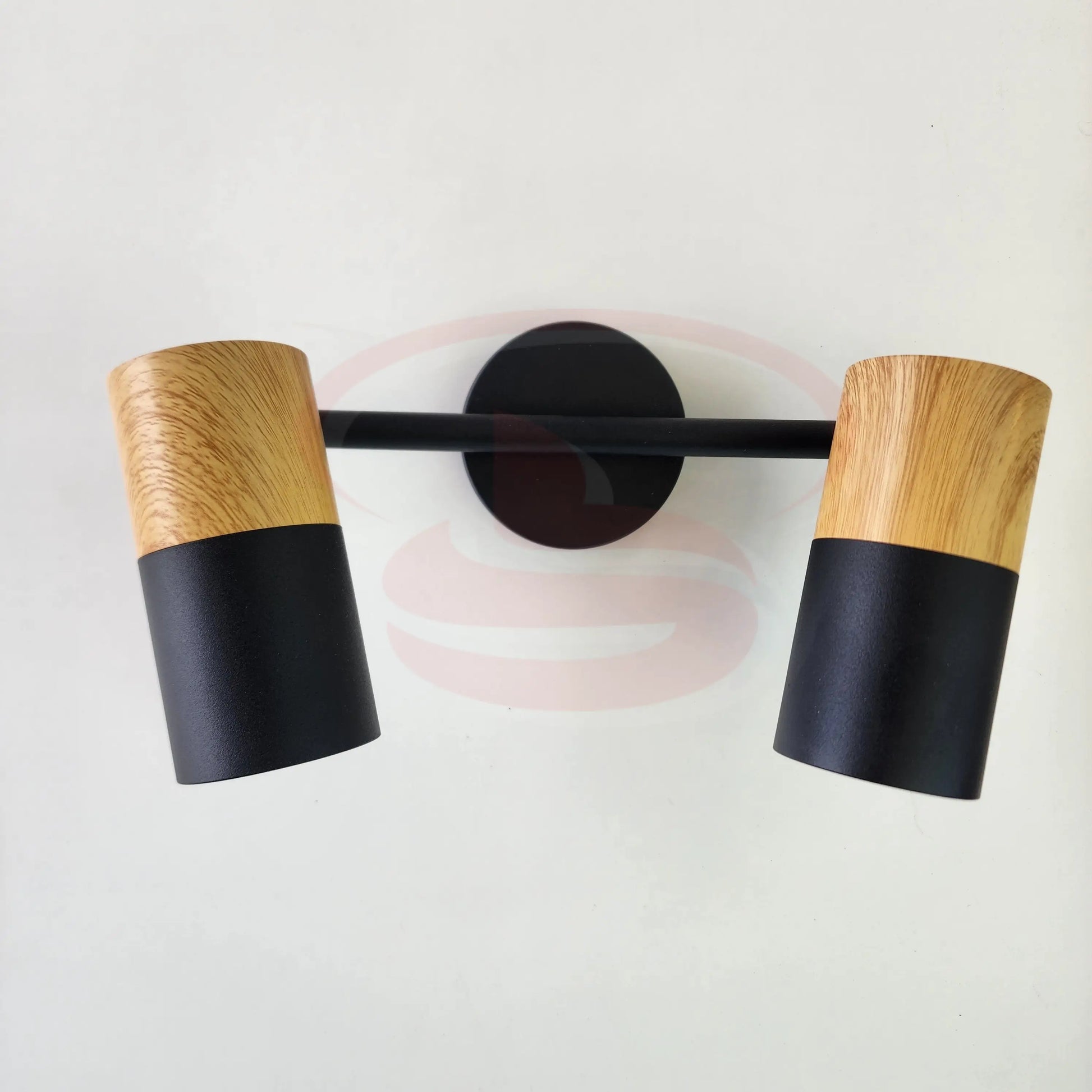 A modern indoor wall spotlight featuring a black rod base and wooden cylinder heads, 2 in One GU10 Globe for home and commercial interiors.
Smart Life Lighting & Electrical