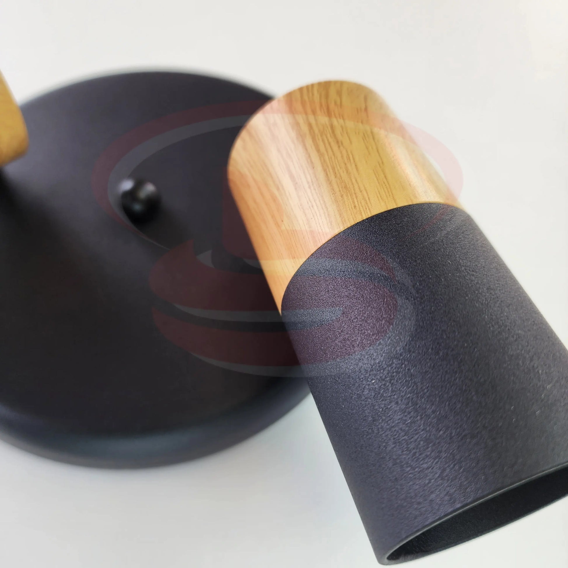 A modern indoor wall spotlight featuring a black round base and wooden cylinder heads, 2 in One GU10 Globe for home and commercial interiors.
Smart Life Lighting & Electrical