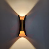 Modern curved black up and down LED wall light with warm white architectural glow for indoor and outdoor wall lighting.
Smart Life Lighting & Electrical